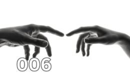Two people gently touching fingers as they let go, symbolising emotional separation.