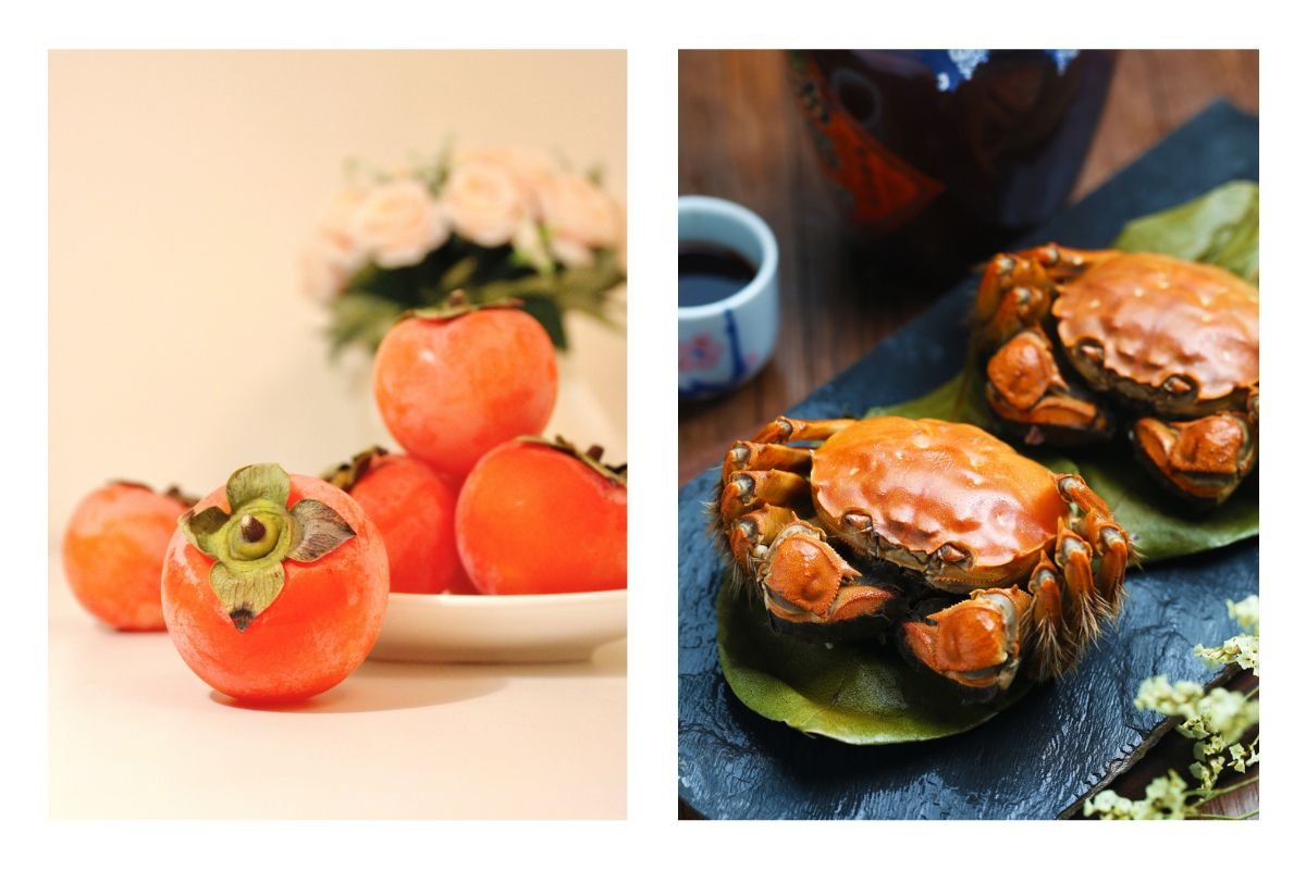 Persimmon and Crab Platter A persimmon fruit paired with cooked crabs on a decorative table.