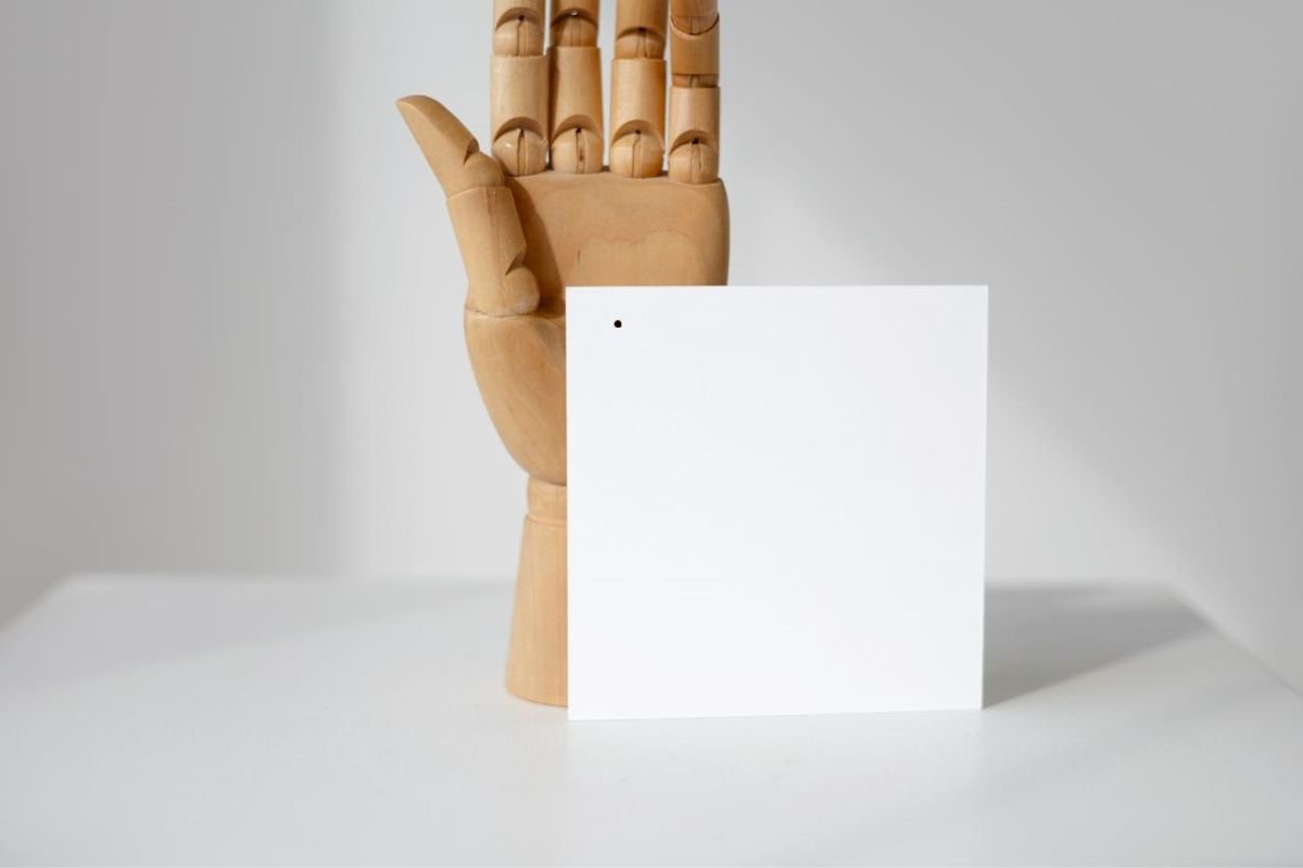 Blank Paper with a Black Dot: Seeing the Bigger Picture in Life A blank piece of paper with a small black dot, symbolising how we focus on problems and miss life’s vast blessings.