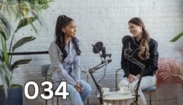 Two women engaged in a meaningful conversation in a broadcasting studio, illustrating emotional intelligence and effective communication.
