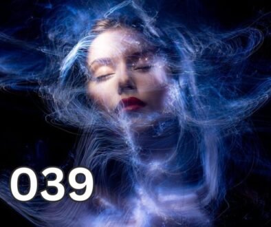 A woman surrounded by glowing energy waves, symbolising the deep connection between emotions and energetic fields.
