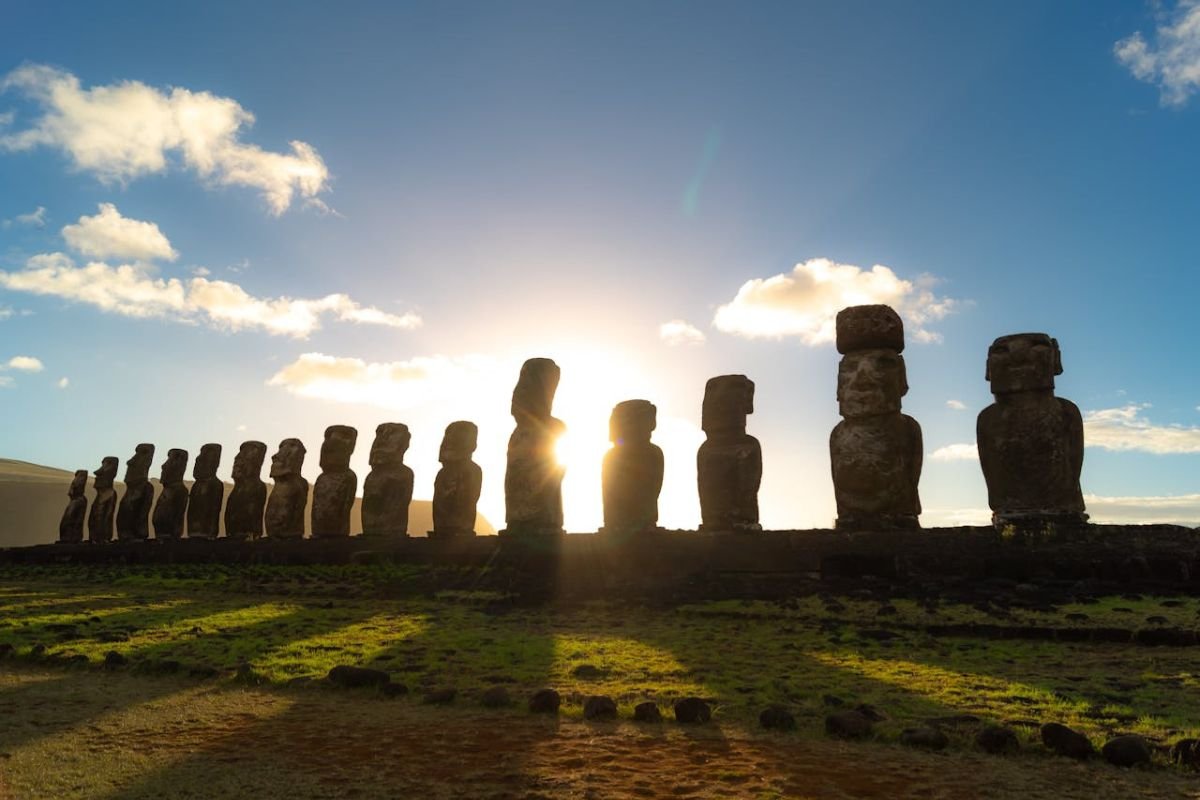 Sweet Potatoes & the Moai: The Crop That Fueled a Civilisation Moai statues on Easter Island, standing tall against the sky, representing the vital role of sweet potatoes in Rapa Nui civilisation.
