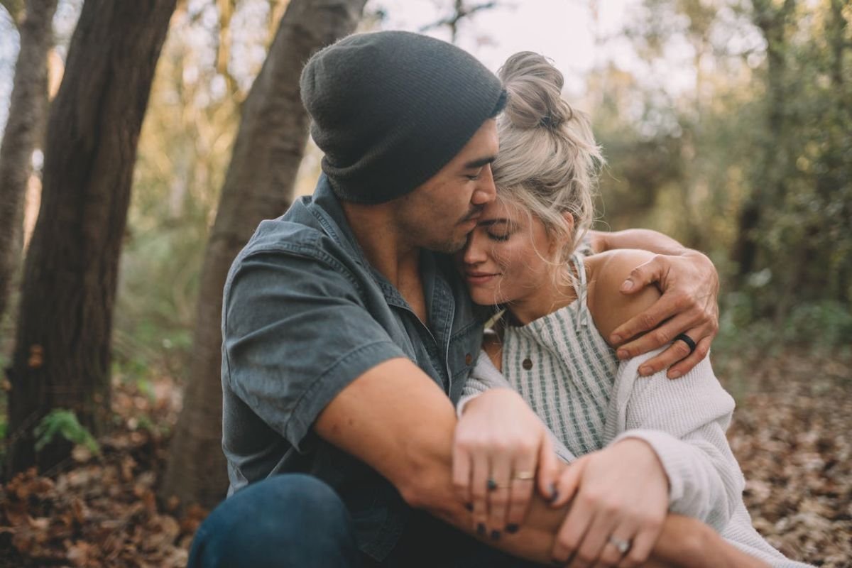 A couple embracing each other, showing emotional support, love, and a husband's commitment during hard times