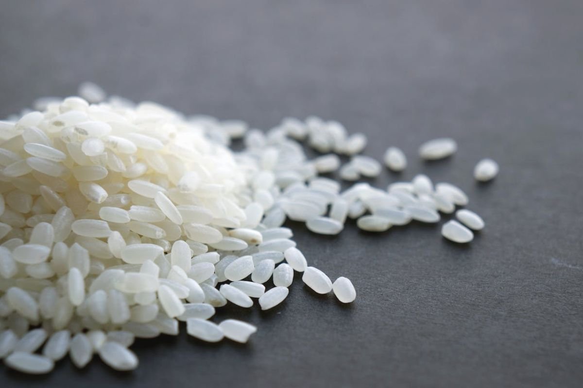Polished White Rice Grains Close-Up White rice grains in close-up showing smooth, polished texture