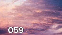 Dreamy purple-tinted clouds floating in a serene night sky