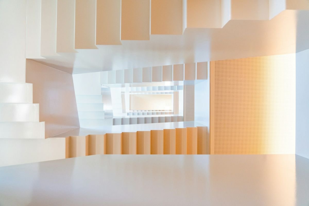 Surreal looping staircase creating endless dreamlike echoes