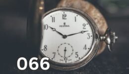 Silver pocket watch showing time