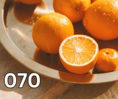 Close-up of fresh whole oranges on a table