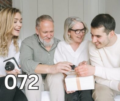 A happy family of four: two elderly parents and two adult children, smiling together, symbolising peace and harmony in family relationships.