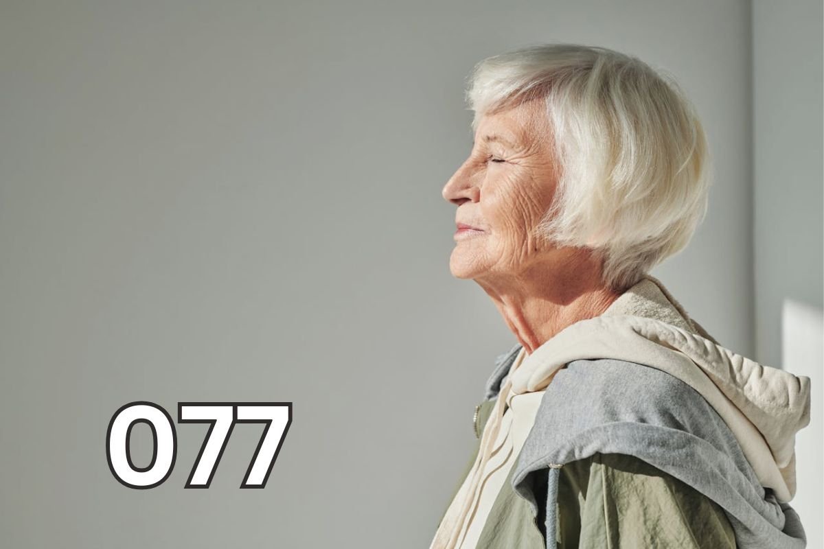 Elderly woman with eyes closed enjoying soft sunlight, symbolising wisdom and calm reflection in marriage advice.