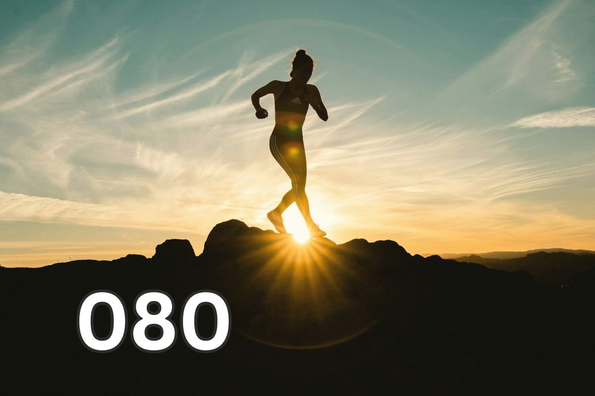 Silhouette of a woman running uphill at sunset, representing strength, vitality, and healthy ageing through movement and circulation