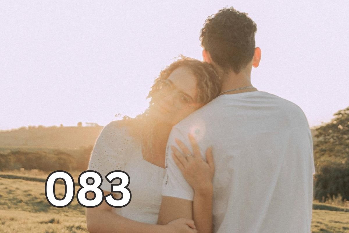 Woman leaning on her partner in an open field, illustrating emotional attachment despite distance.