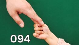 Adult holding a child's hand, symbolising inner child healing, emotional support, and healing childhood wounds.