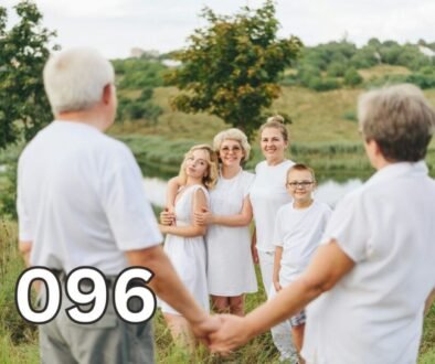 Parents of adult children standing with their children and grandchildren, representing family relationships, independence, and healthy ageing.