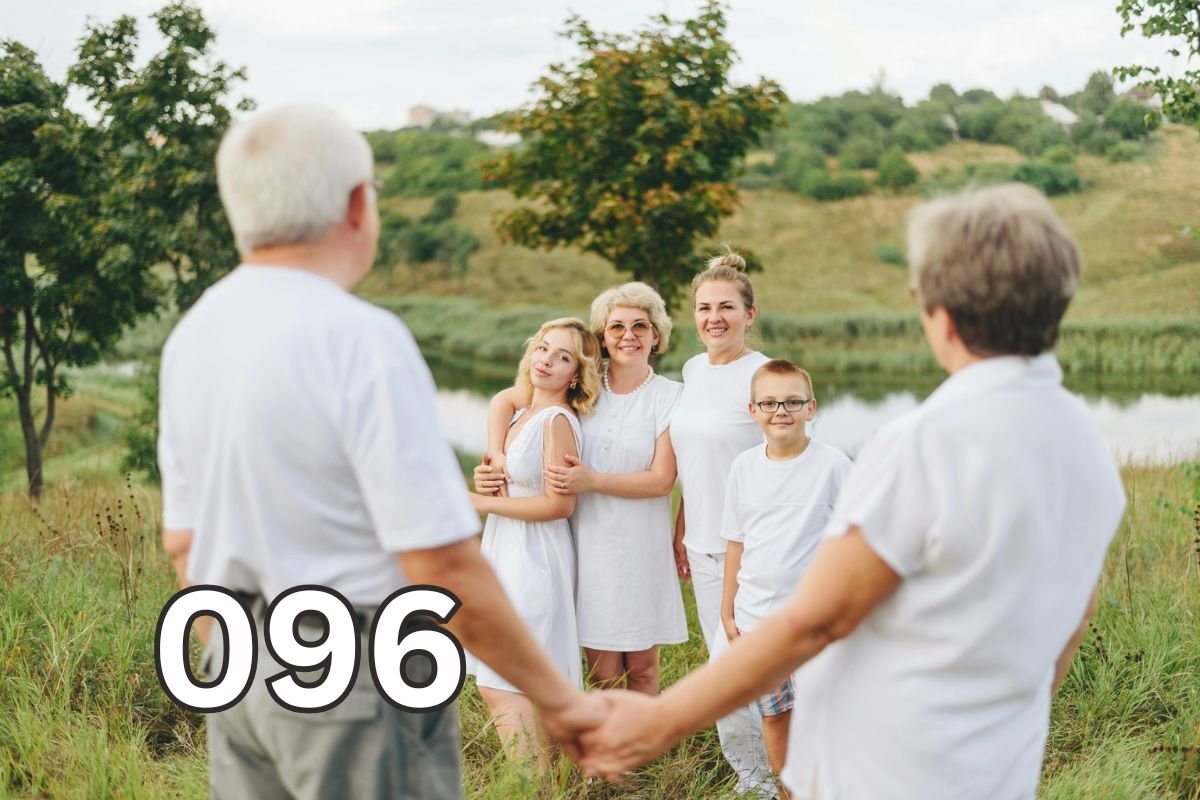 Parents of adult children standing with their children and grandchildren, representing family relationships, independence, and healthy ageing.